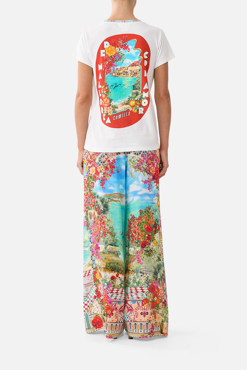 The CAMILLA slim fit round neck t shirt in our print Meet Me in Mallorca. Back model view.