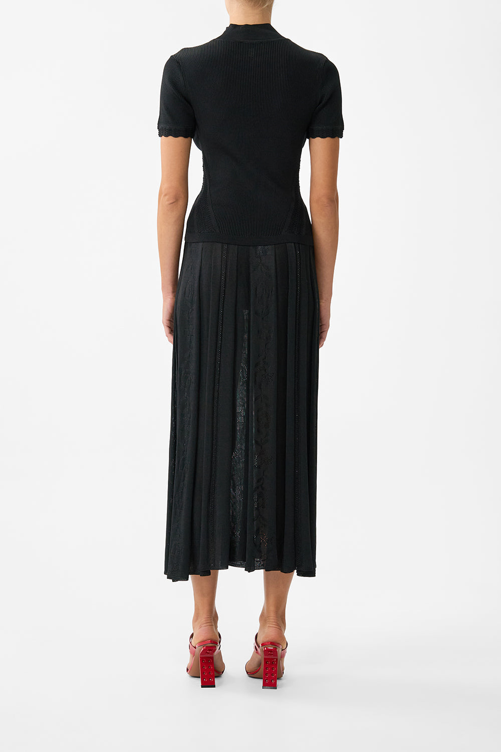 The CAMILLA MOCK NECK KNIT TOP FLAMENCO FOLKLORE in our  print.