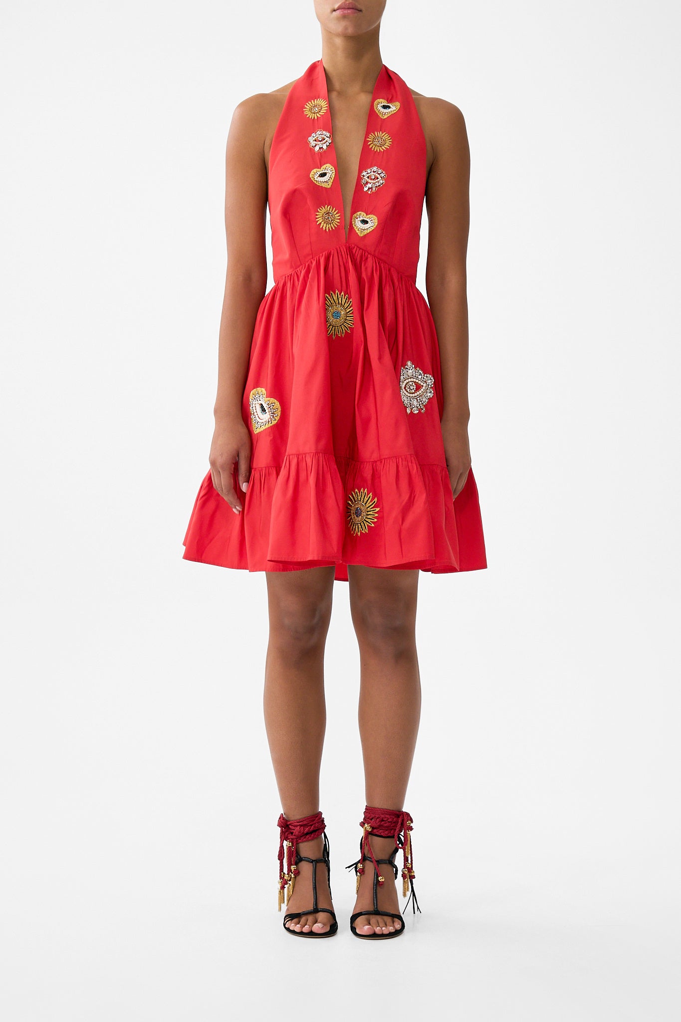 The CAMILLA RUFFLE HEM HALTER SHORT DRESS NAZAR NIRVANA in our NAZAR NIRVANA print.