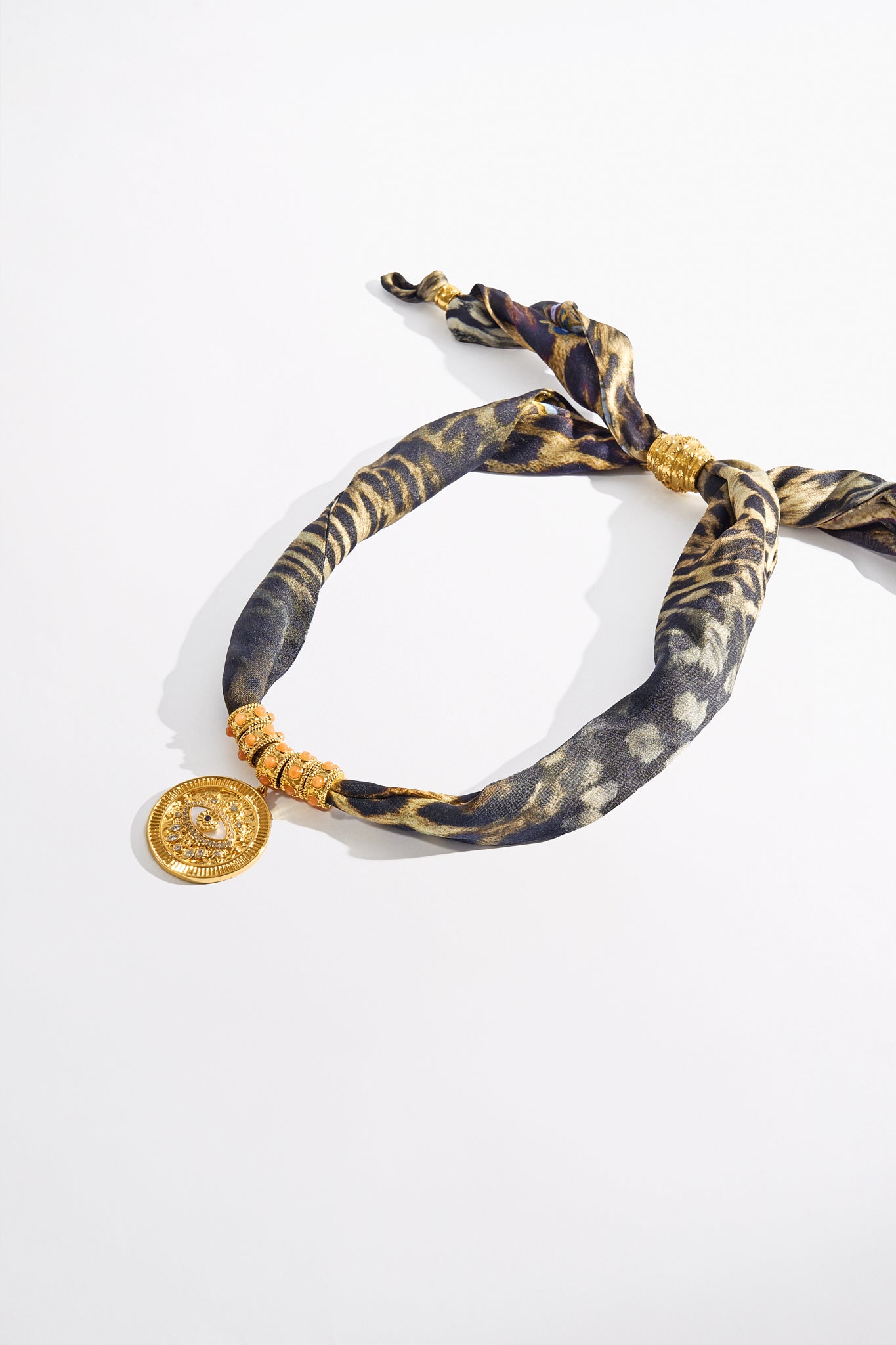 The CAMILLA ENCHANTED OCEANIA SILK NECKLACE GOLD in our GOLD print.