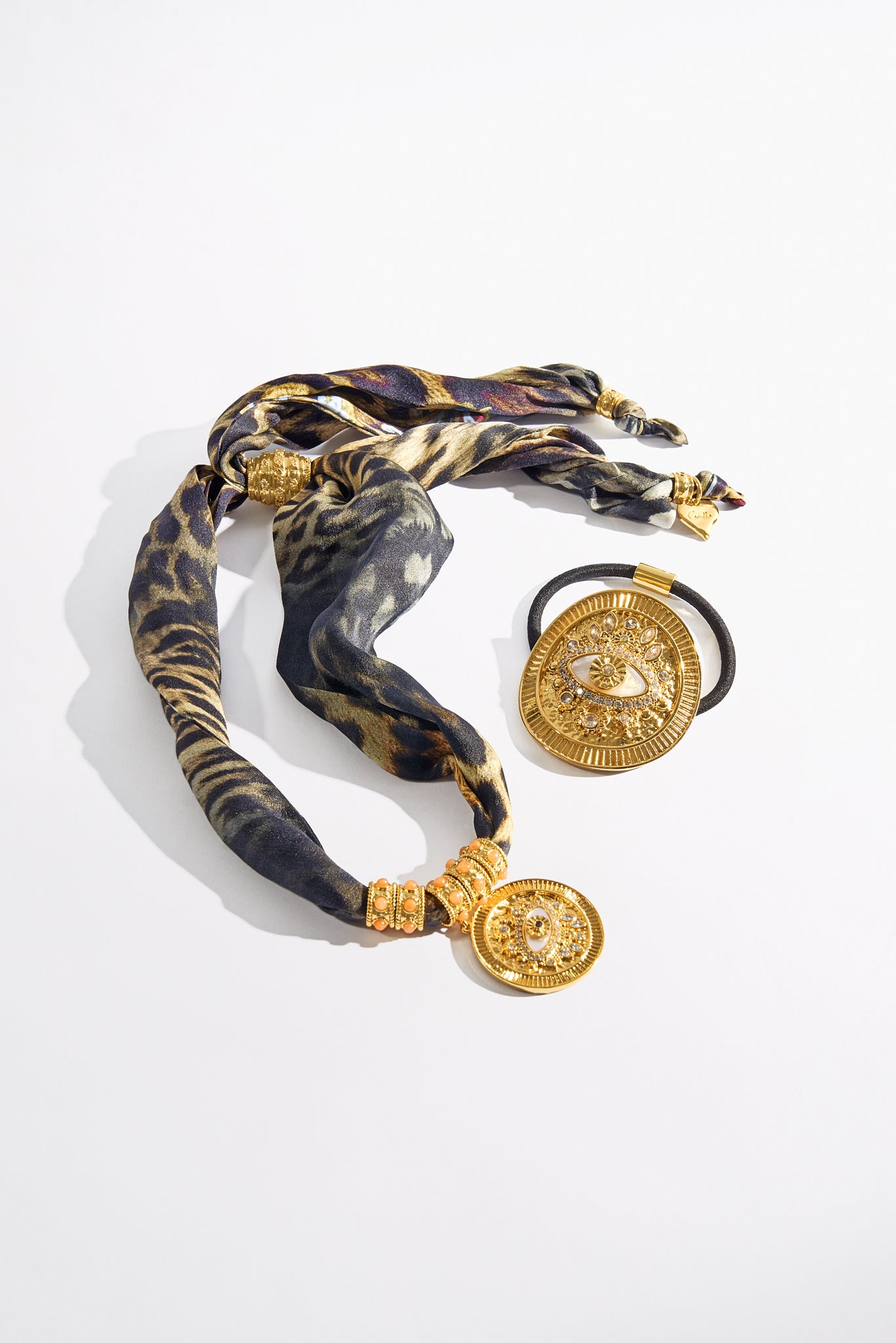 The CAMILLA ENCHANTED OCEANIA SILK NECKLACE GOLD in our  print.
