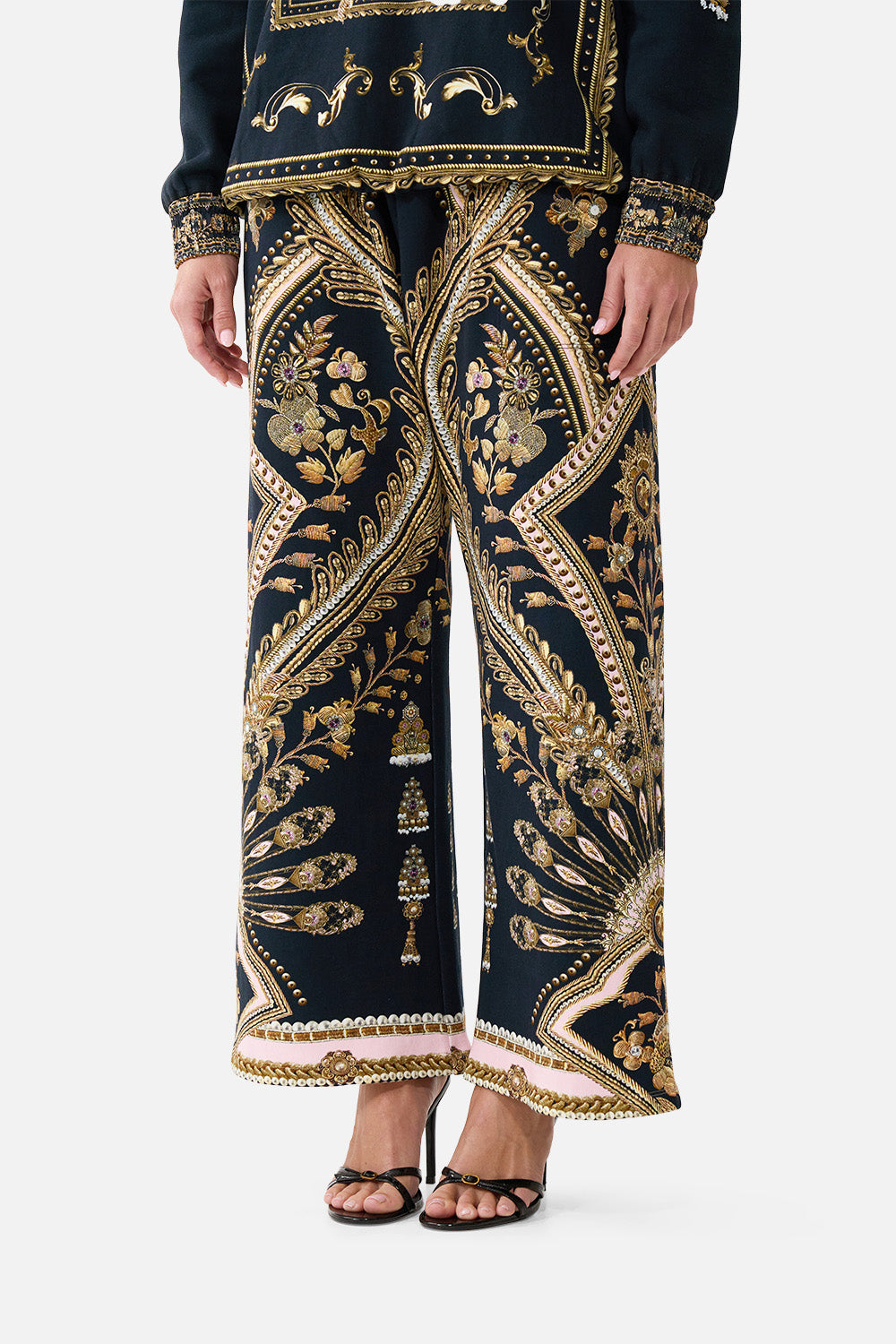 The CAMILLA STRAIGHT LEG TRACK PANT TAURUS RISING in our  print.