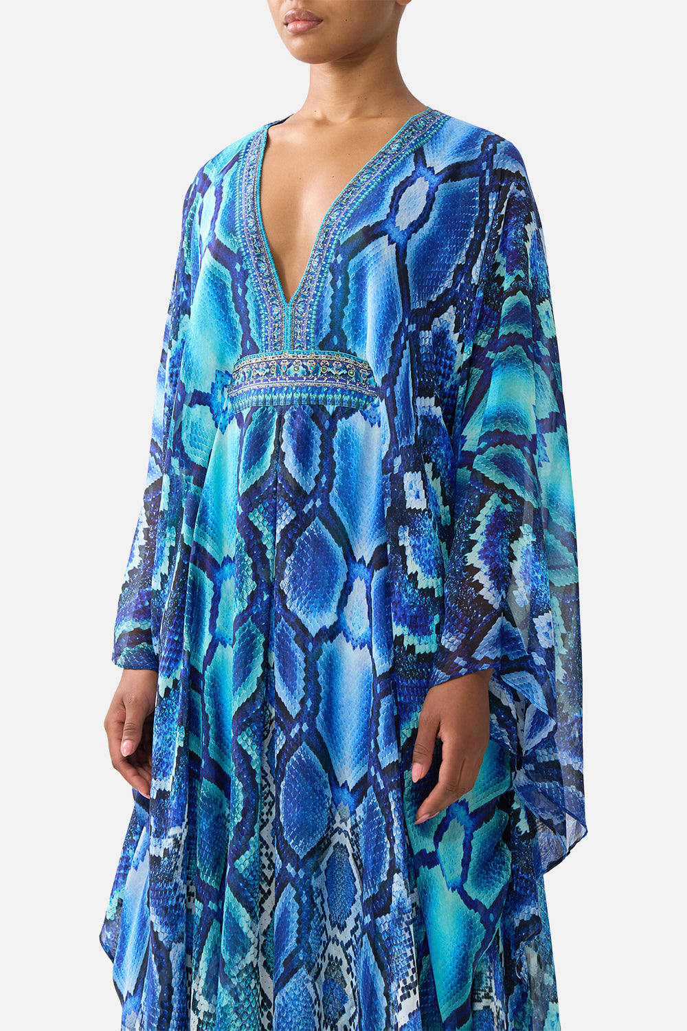 The CAMILLA LONG KAFTAN WITH WAIST DETAIL THE SAPPHIRE SERPENT in our  print.