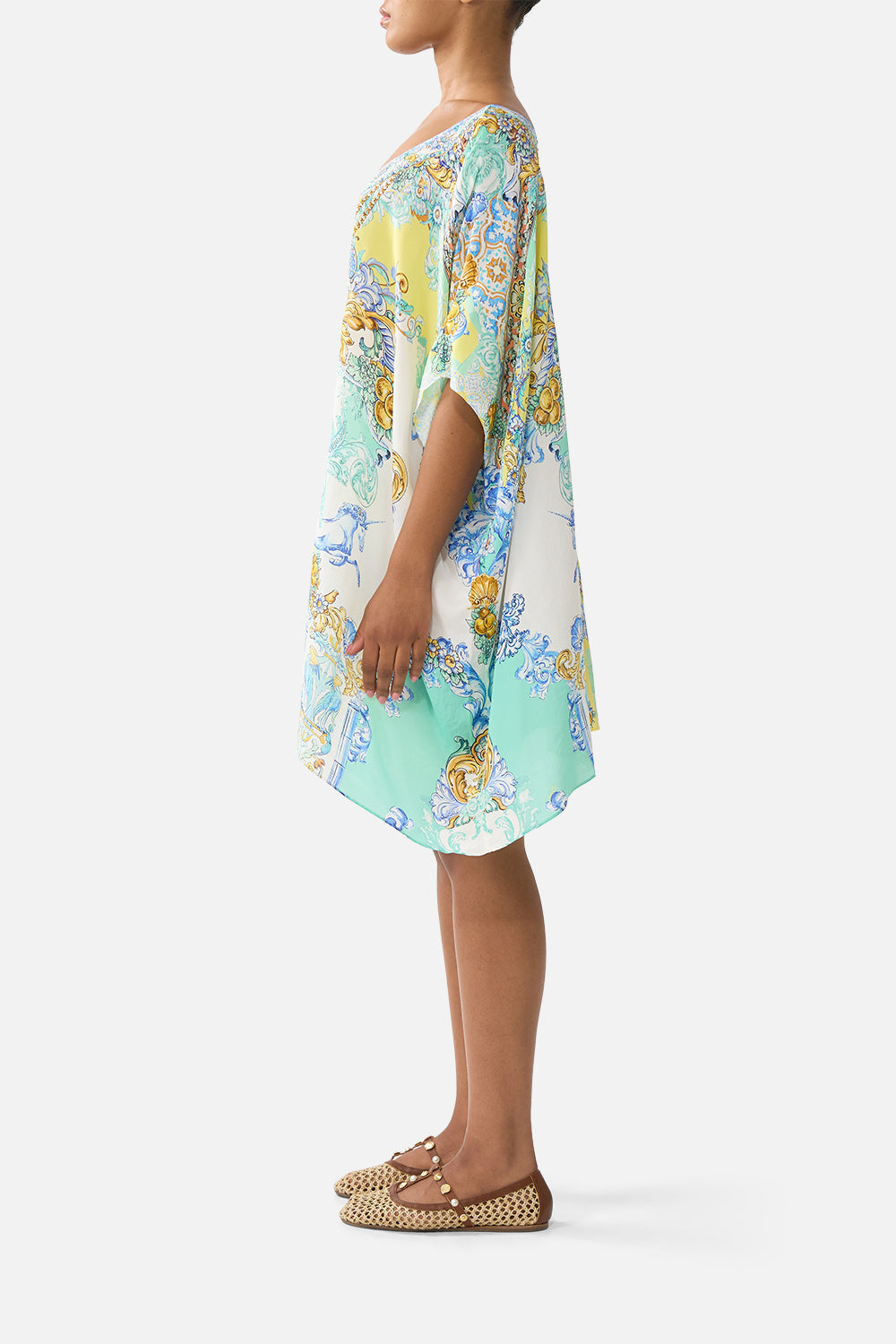 The CAMILLA SHORT ROUND NECK KAFTAN DIAL UP THE TILES in our  print.
