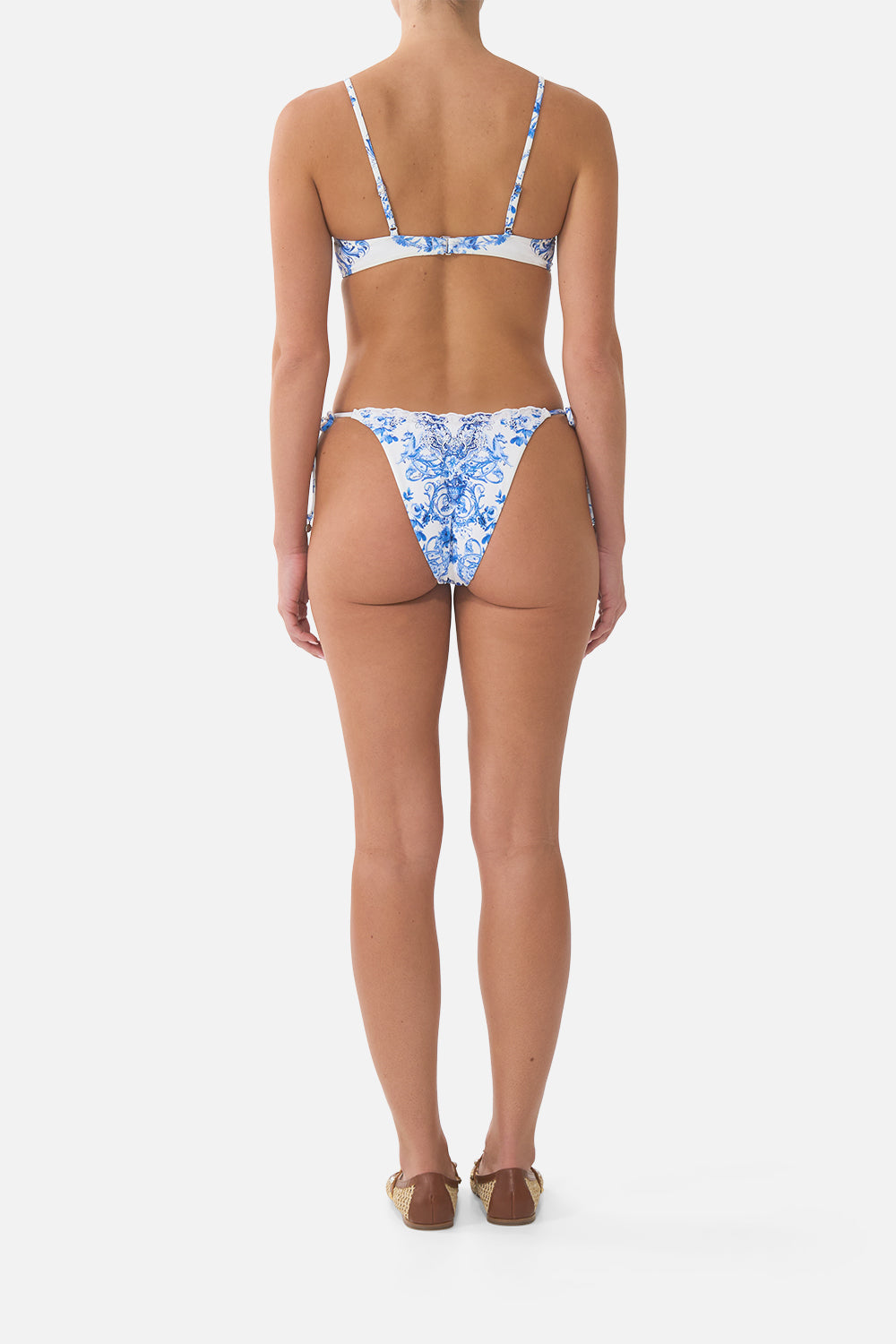 The CAMILLA DIP WAIST CHEEKY BIKINI BOTTOM WITH TIE SIDES CERAMIC PANORAMIC in our  print.