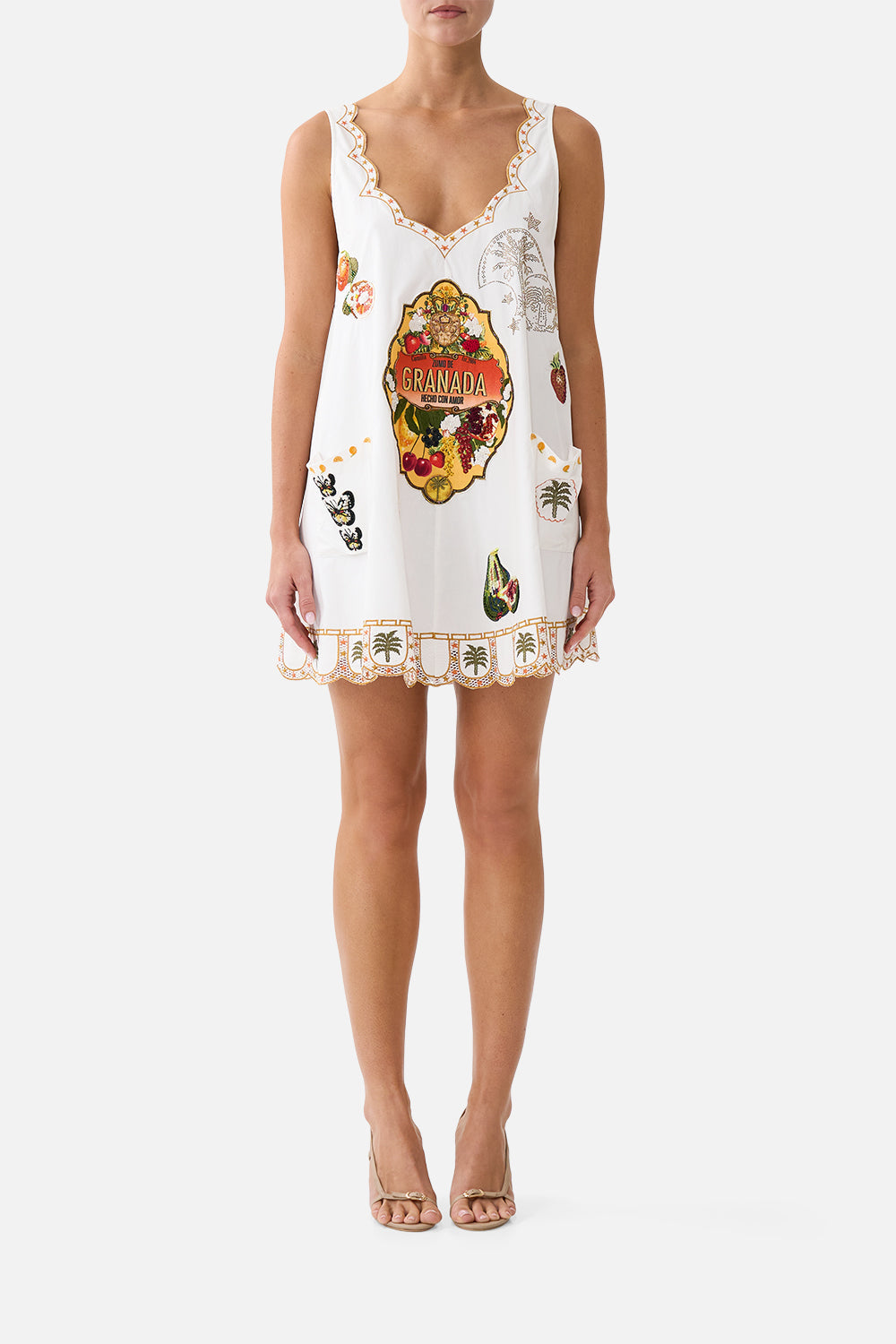 The CAMILLA SHORT POCKET DRESS WITH LOW BACK VA VA VINTAGE in our VA VA VINTAGE print.