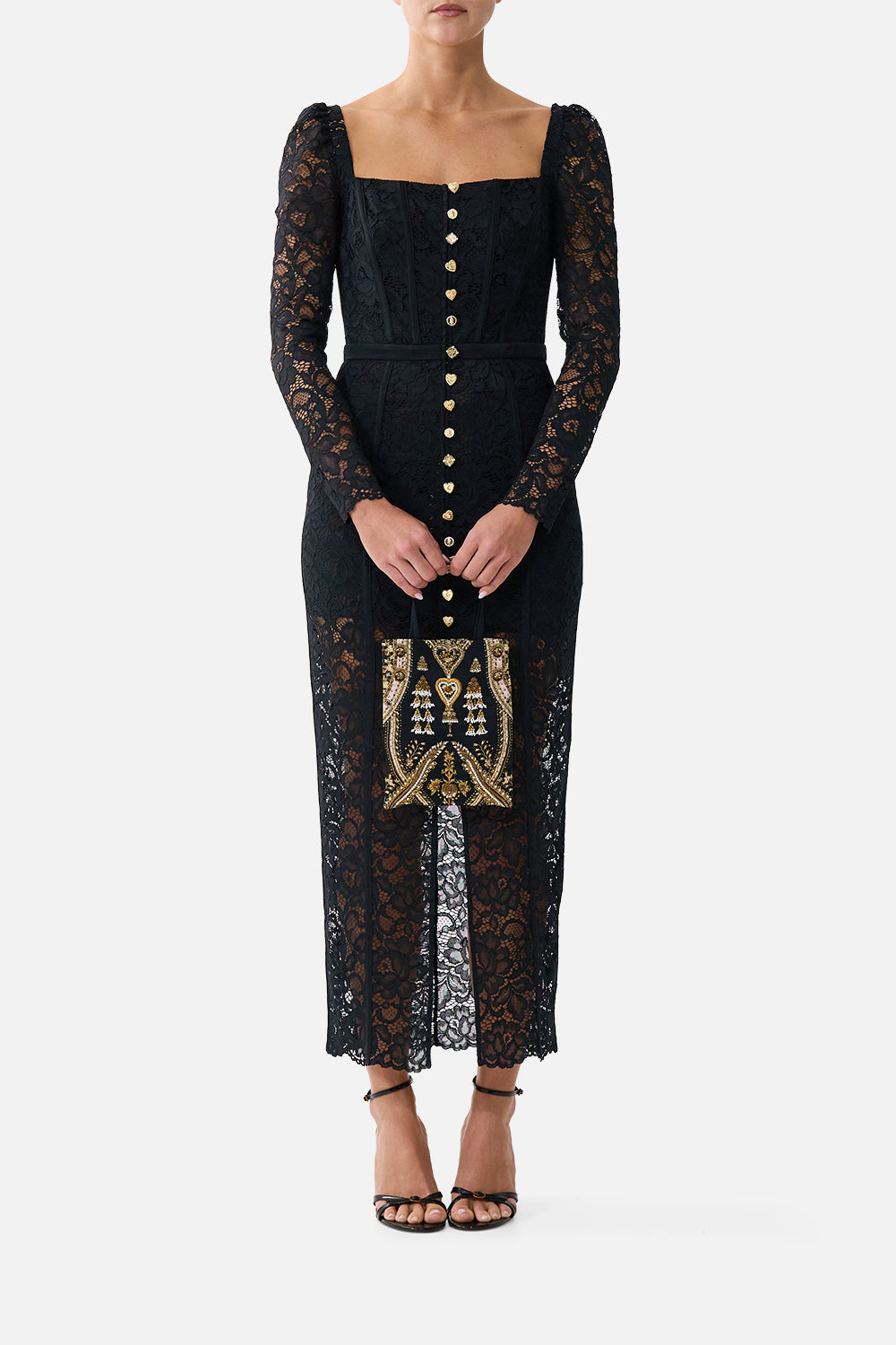 The CAMILLA embellished mini tote with chain strap in our print Taurus Rising. Front model view.