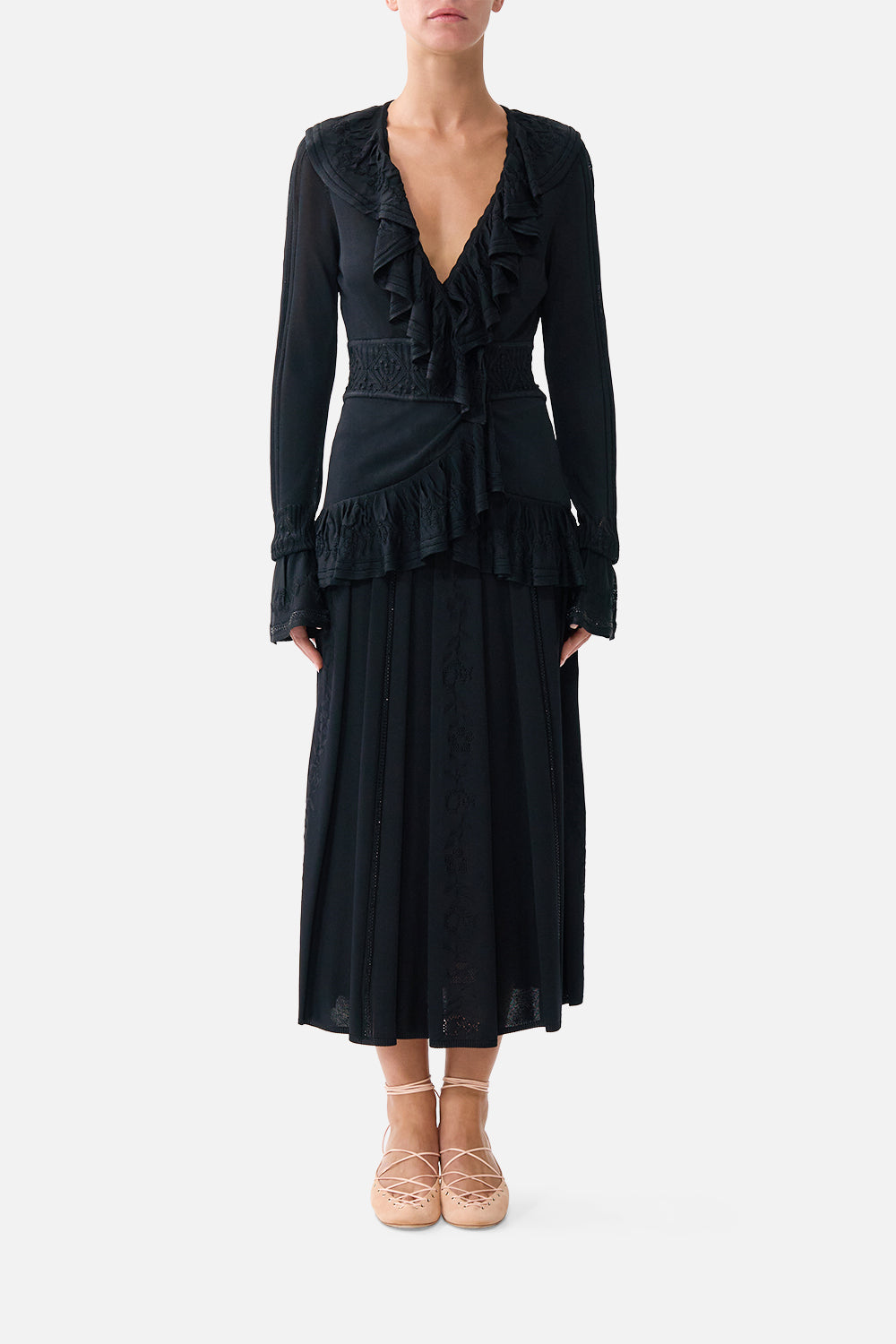 The CAMILLA PLEATED KNIT SKIRT FLAMENCO FOLKLORE in our FLAMENCO FOLKLORE print.