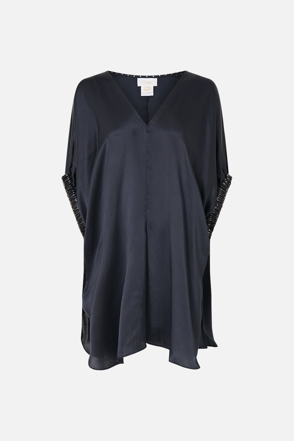 The CAMILLA GATHERED CUFF V NECK TOP DAUGHTERS OF DUENDE in our  print.