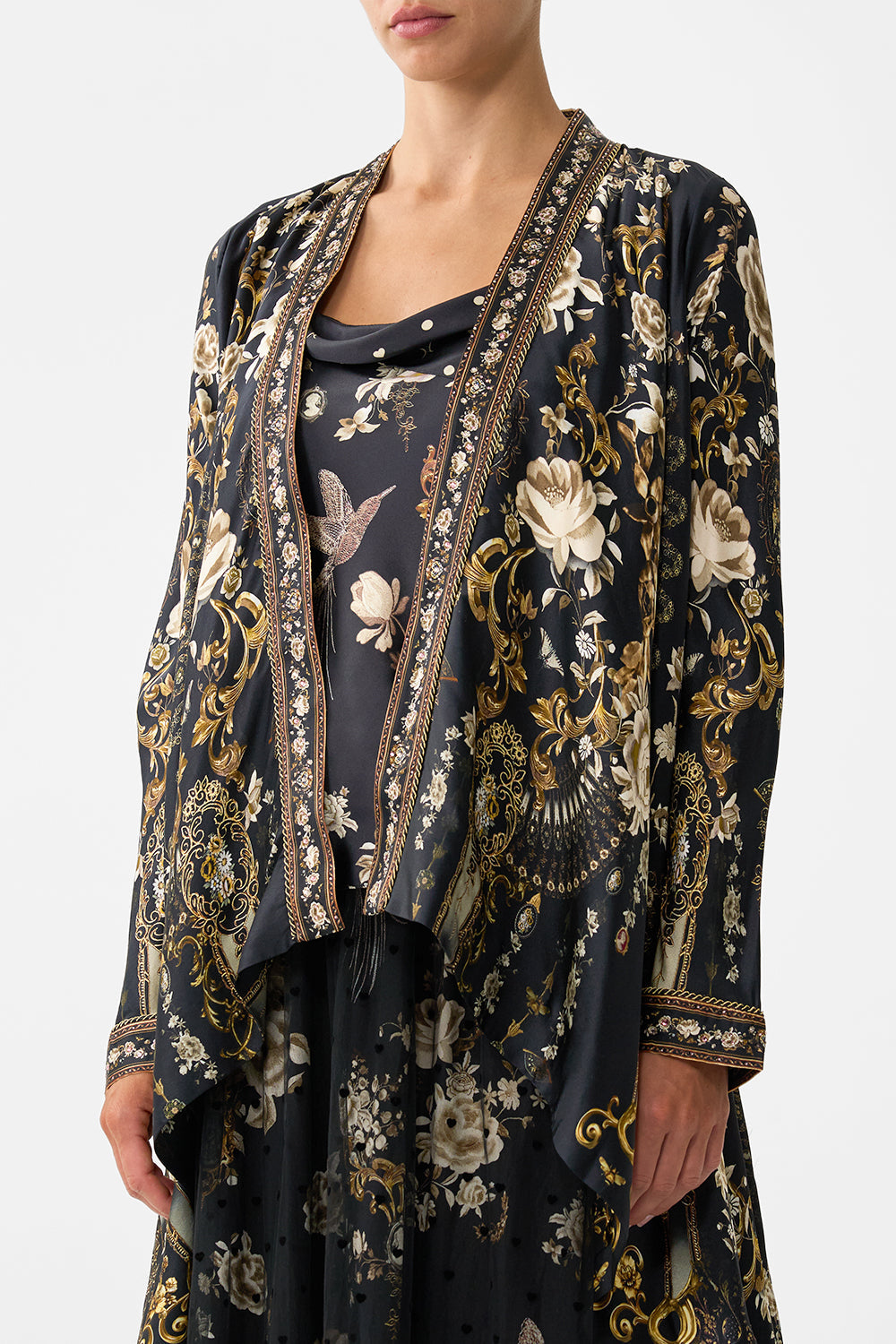 The CAMILLA CROPPED SLEEVE LAYER WITH WAIST TIE FLAMENCO FOLKLORE in our  print.