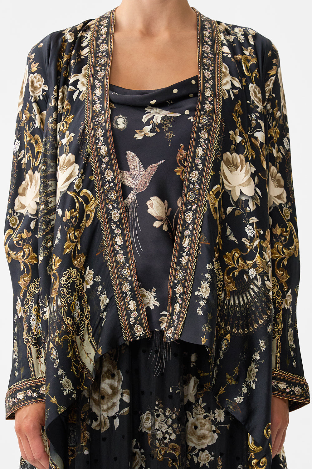The CAMILLA CROPPED SLEEVE LAYER WITH WAIST TIE FLAMENCO FOLKLORE in our  print.