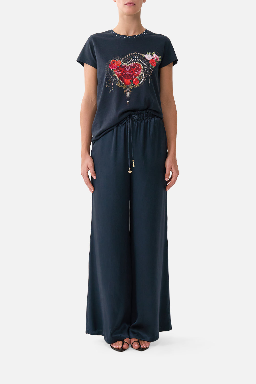 The CAMILLA lounge pant in our print Daughters of Duende. Front model view.