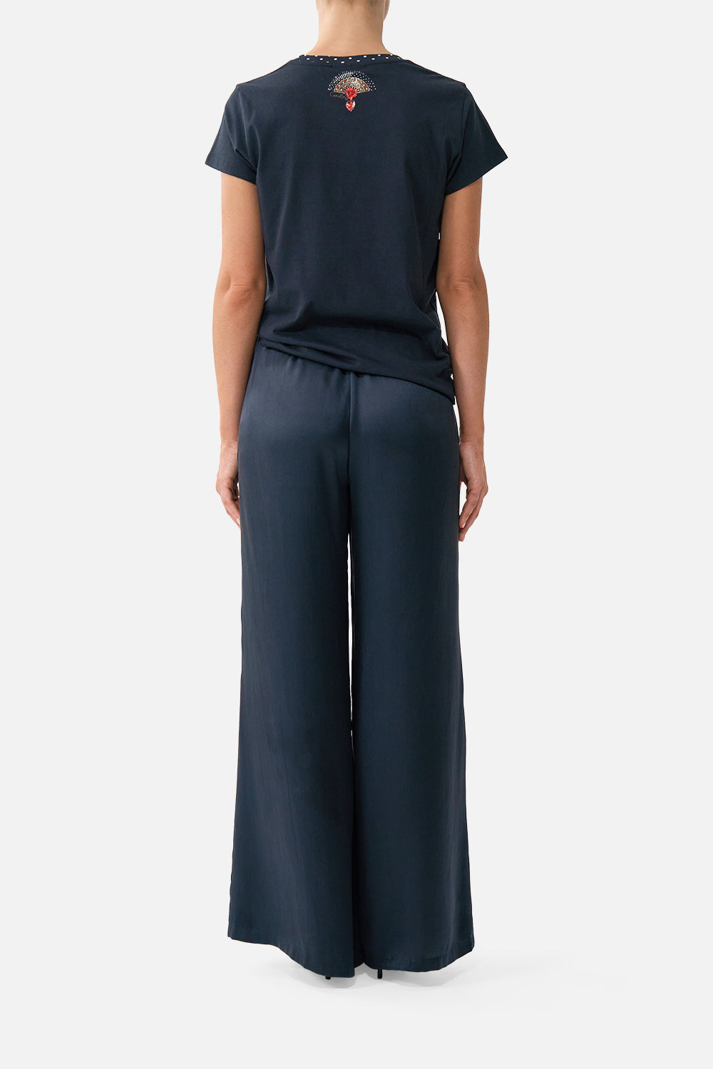 The CAMILLA lounge pant in our print Daughters of Duende. Back model view.