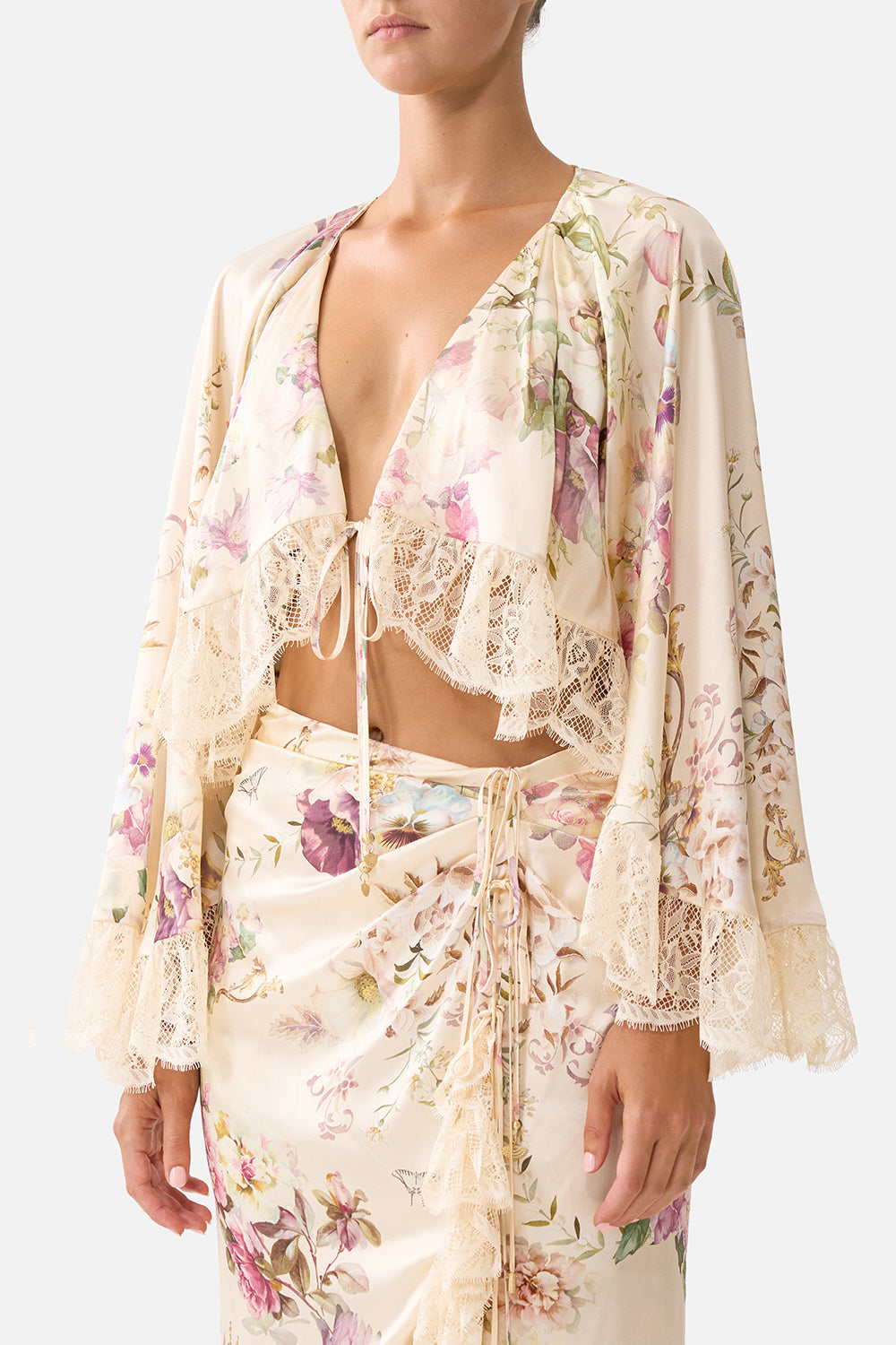 The CAMILLA CROP RUFFLE TOP ADORNED IN ARANJUEZ in our  print.