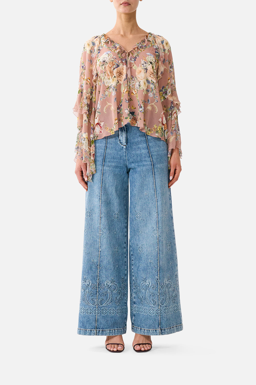 The CAMILLA LACE UP V NECK BLOUSE WITH CASCADE RUFFLES CHAMBER OF BLOOMSCHAMBER OF BLOOMS