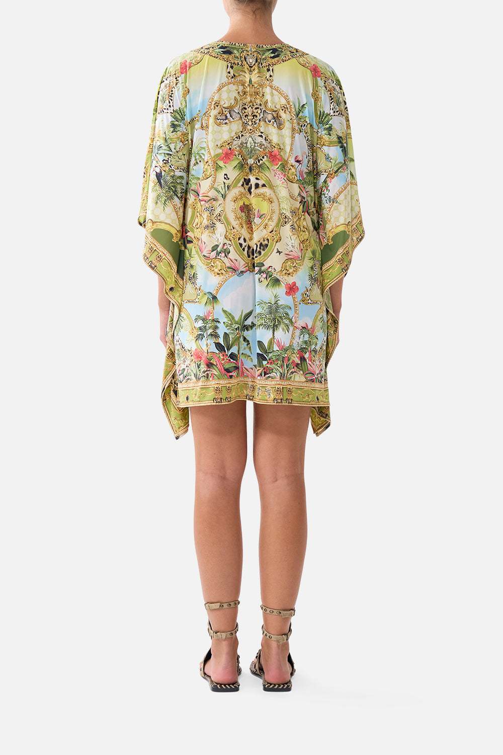 The CAMILLA Short V Neck Kaftan with Ring Front Trim in our Wanderlust Empire print, back view on model.