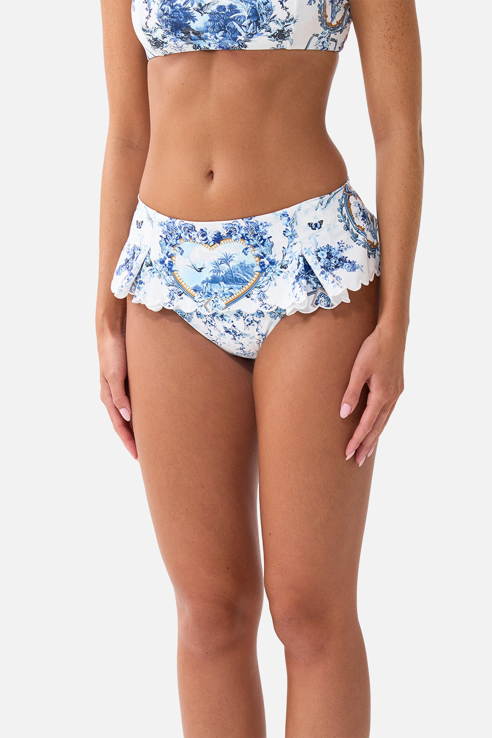 The CAMILLA HIGH WAISTED BIKINI BOTTOM WITH SKIRT THE PORCELAIN PARLOUR