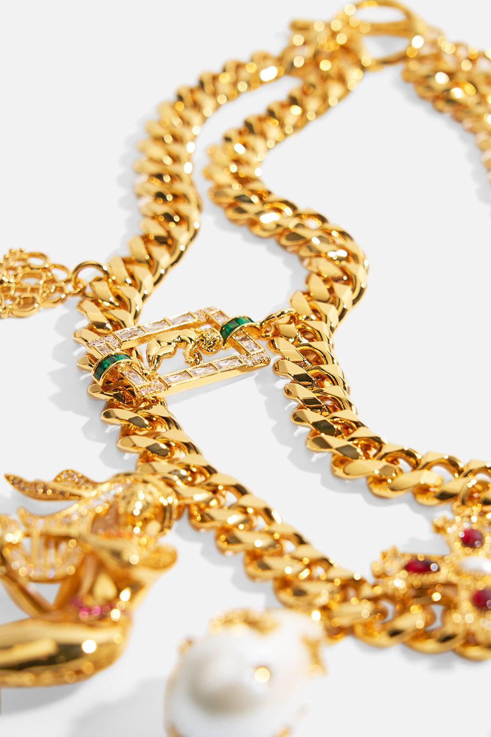 QUEEN OF CHARMS STATEMENT NECKLACE GOLD