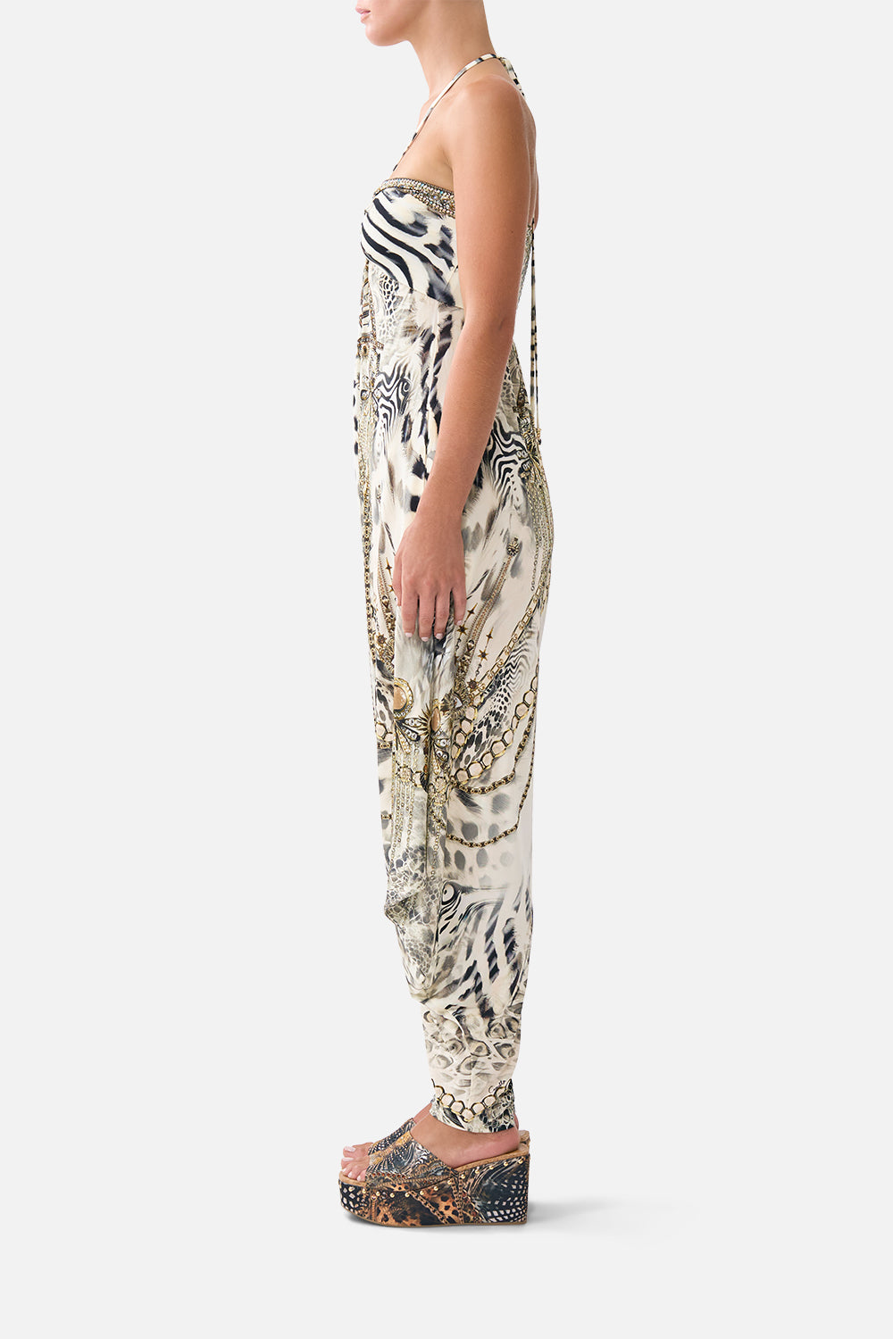 The CAMILLA DRAPED PANT JUMPSUIT WITH HARDWARE LADY LIONHEART in our  print.