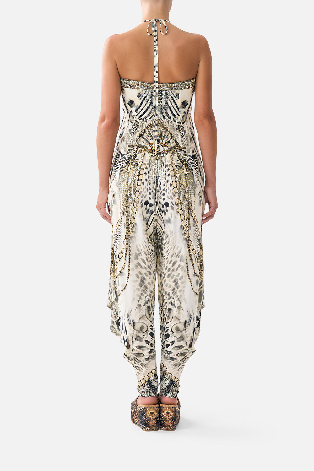 The CAMILLA DRAPED PANT JUMPSUIT WITH HARDWARE LADY LIONHEART in our  print.