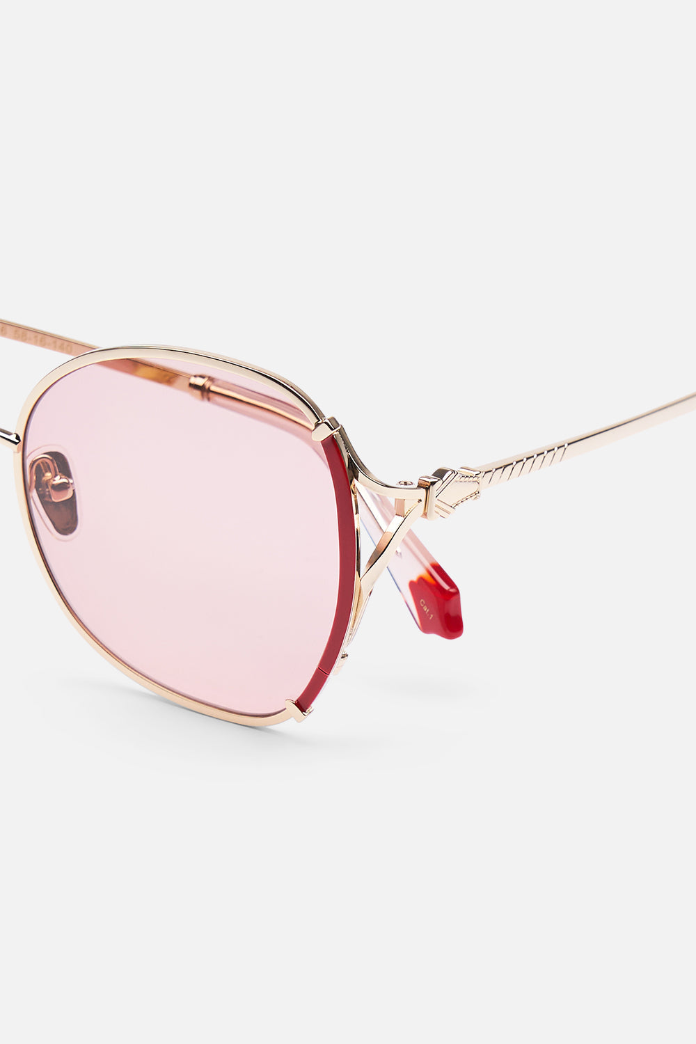 The CAMILLA LADY LIBERTINE SUNGLASSES GOLD / BURGUNDY in our  print.