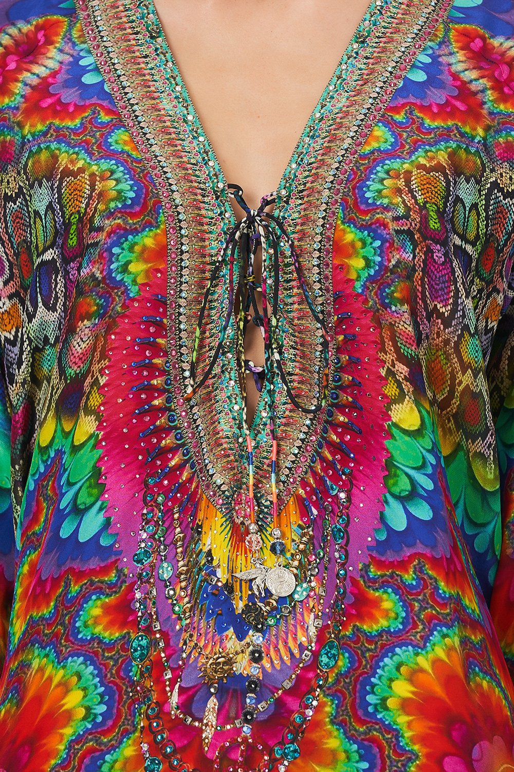 LACE UP BLOUSE COMING DOWN FROM COSMOS