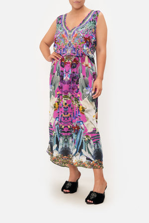 Front view of curvy model wearing CAMILLA plus size silk maxi dress in Exotica Erotica print 