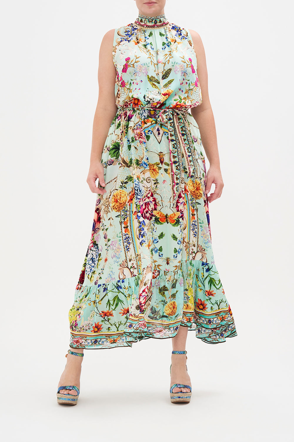 Front view of curvy model wearing CAMILLA plus size floral print maxi dress in Honey Honey print